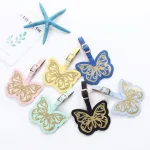 étiquette bagage avec motif papillon