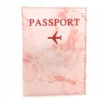 passeport marbré avec motif d'avion